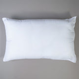 Garnissage du coussin en tissu microfibre