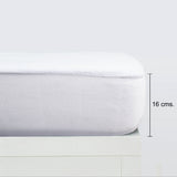 Protège-matelas pour berceau