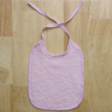 Bavoir en éponge rose uni 20x25