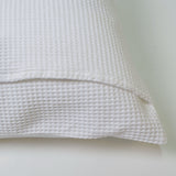 Funda de cojín nido abeja algodón blanco