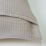Housse de coussin nid d'abeille en coton beige 107