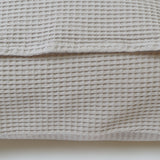 Housse de coussin nid d'abeille en coton beige 107