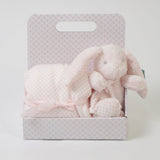 Polka dot blanket + pink stuffed rabbit