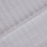 Crossed mattress cover for crib