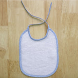 Bavoir éponge uni blanc/bleu 20x25