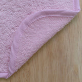Bavoir éponge uni rose 25x30