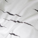 Housse de coussin tricotée en coton noué
