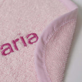 Bavoir en éponge rose prénom brodé