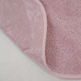 Bavoir en plastique éponge avec caoutchouc rose pâle