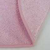 Bavoir en plastique éponge avec caoutchouc rose