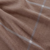 Couverture carrée en sherpa beige